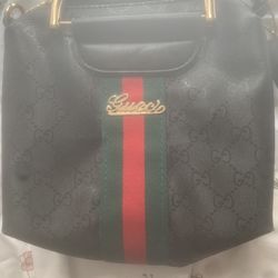 Black And Gold Gucci Cross Body Bag