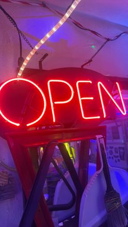 Open glass tube neon sign