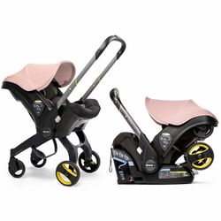  Doona + Car Seat And Stroller Pink With Sun Protection 360