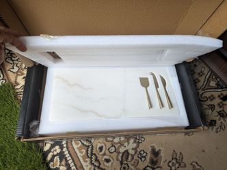 New in box brand new cutting board