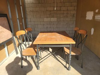 Wood/iron dining table 36×48  & 4 chairs $100 a little dusty