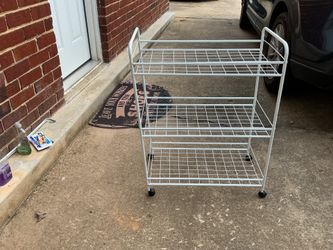 A nice white shelf with3 shelves (24” long x 33” tall x 13” wide)