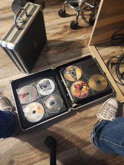 2 Cases Of DVD Movies 