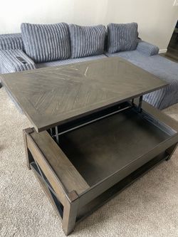 Coffee table with lift top