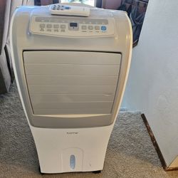  Air conditioner evaporative cooler