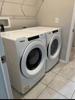 One year old Whirlpool Front-Load Washer and Dryer Set