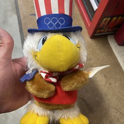 vintage 1980s Sam the Olympic Eagle plush toy, the mascot for the 1984 Los Angeles Summer Olympic Games, often produced by Wallace Berrie & Company or
