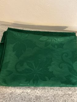 DARK GREEN OBLONG TABLECLOTH WITH POINSETTIA PATTERN - $10