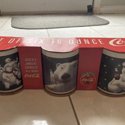 BRAND NEW ORIGINAL COCA COLA 6 HOLIDAY COLLECTORS MUGS.  ORIGINAL BOX INCLUDED.  BEST OFFER FOR ALL 6 COLLECTORS MUGS 🥤🥤🥤