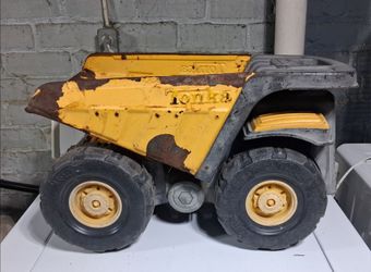 Old rusty Tonka truck. 26x22 canvas wall picture