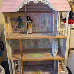 Dollhouse And Barbies