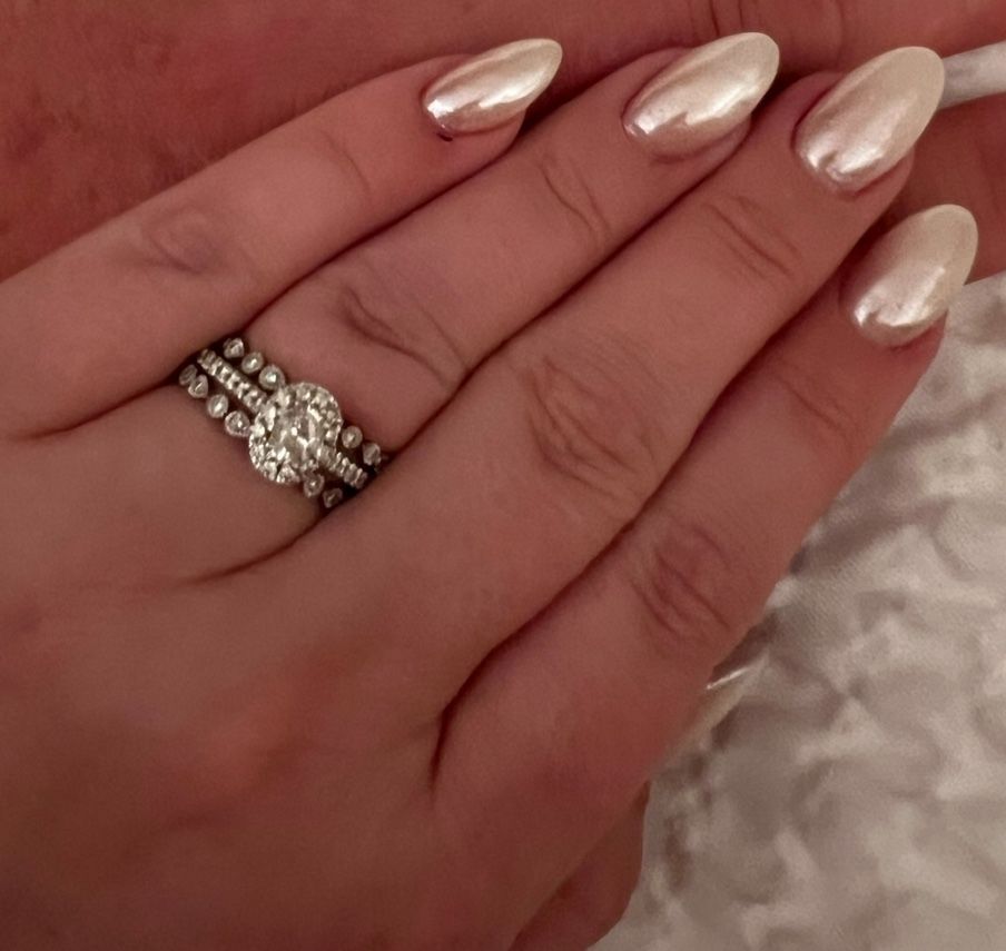 Diamond engagement ring, and two wedding bands