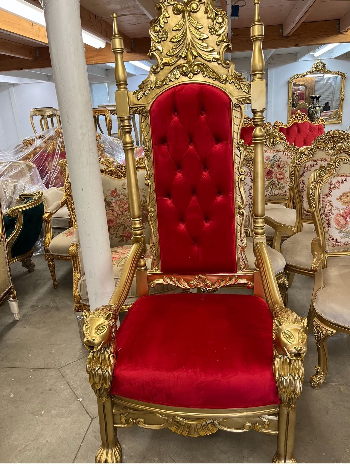 Royal lioness throne chair gold leaf  Hands carving on beech wood lioness of Madagascar Imported from Egypt $1000 dollars each. We import all