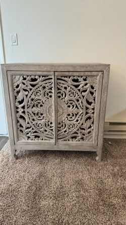 am selling a beautiful piece of furniture—very elegant and of good quality.