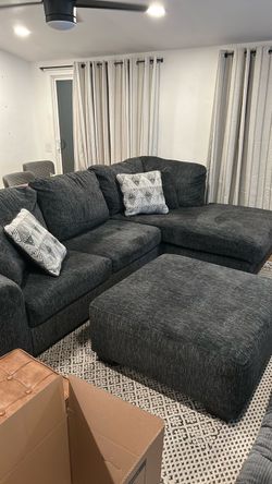 Full sofa sleeper with chaise and oversized ottoman ( four throw pillows included)