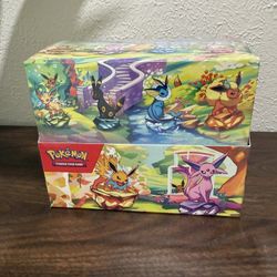 Pokemon Prismatic Evolutions Tin Display 