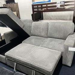 Light Grey Reversible Sectional Sleeper W/ Storage