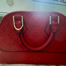 Louis Vuitton Leather Handbag (Alma)