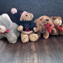 Collection of four festive stuffed animals,