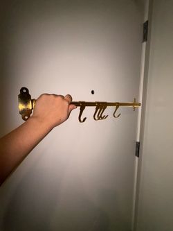IKEA Gold rod with hooks.