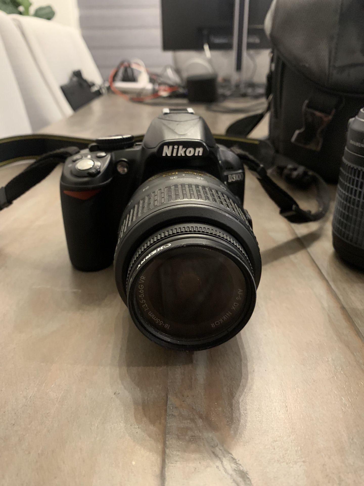 Nikon D3100 14.2MP Digital SLR Double Zoom Lense kit With18-55mm And 55-200mm DX Zoom Lenses Black