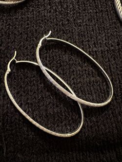Long silver hoop earrings