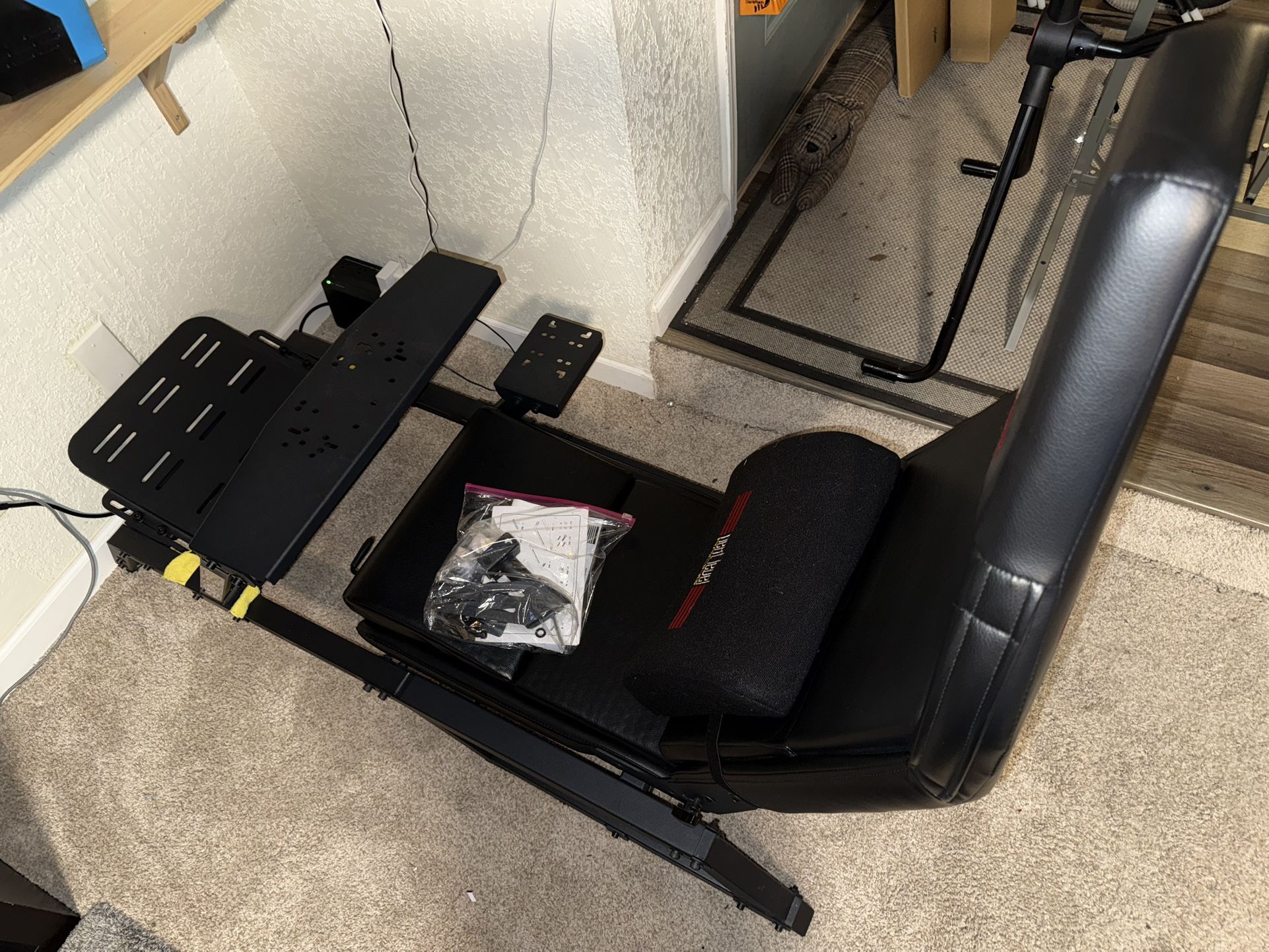 Next Level Racing F-GT cockpit and Lite Free Standing monitor stand