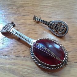 Vintage jewelry.  Classic Brooches.  