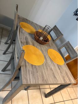 Dining room table with four chairs