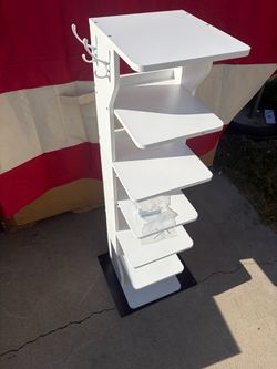 Shelf with hooks