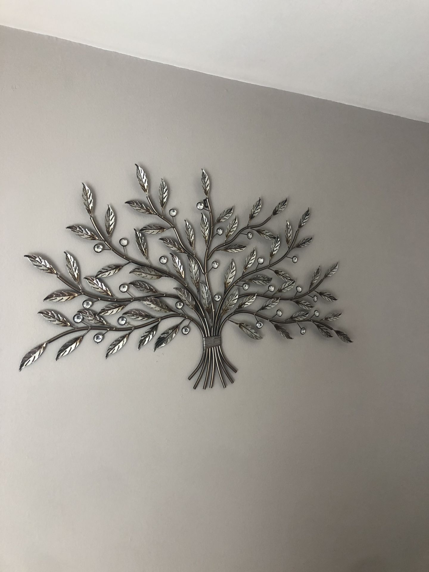 Call wall decoration it’s made of silver metal