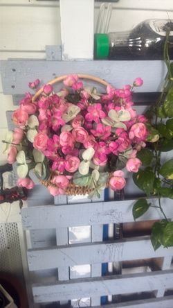 Artificial Pink Roses in Wicker Basket