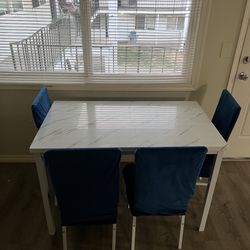 Dinning Area  With Chairs 