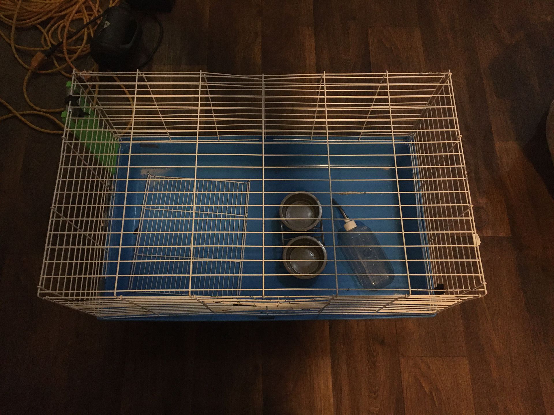 Pet cage and food and water dispenser