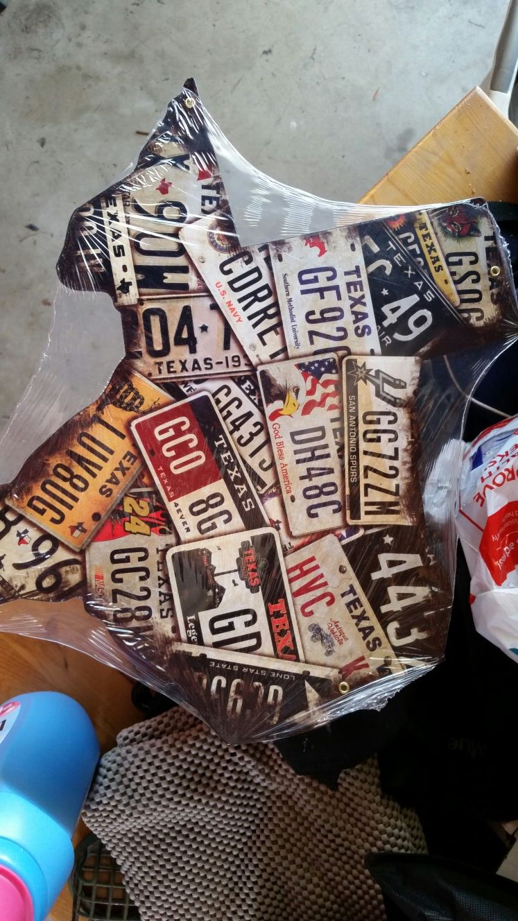 Texas shaped metal sign