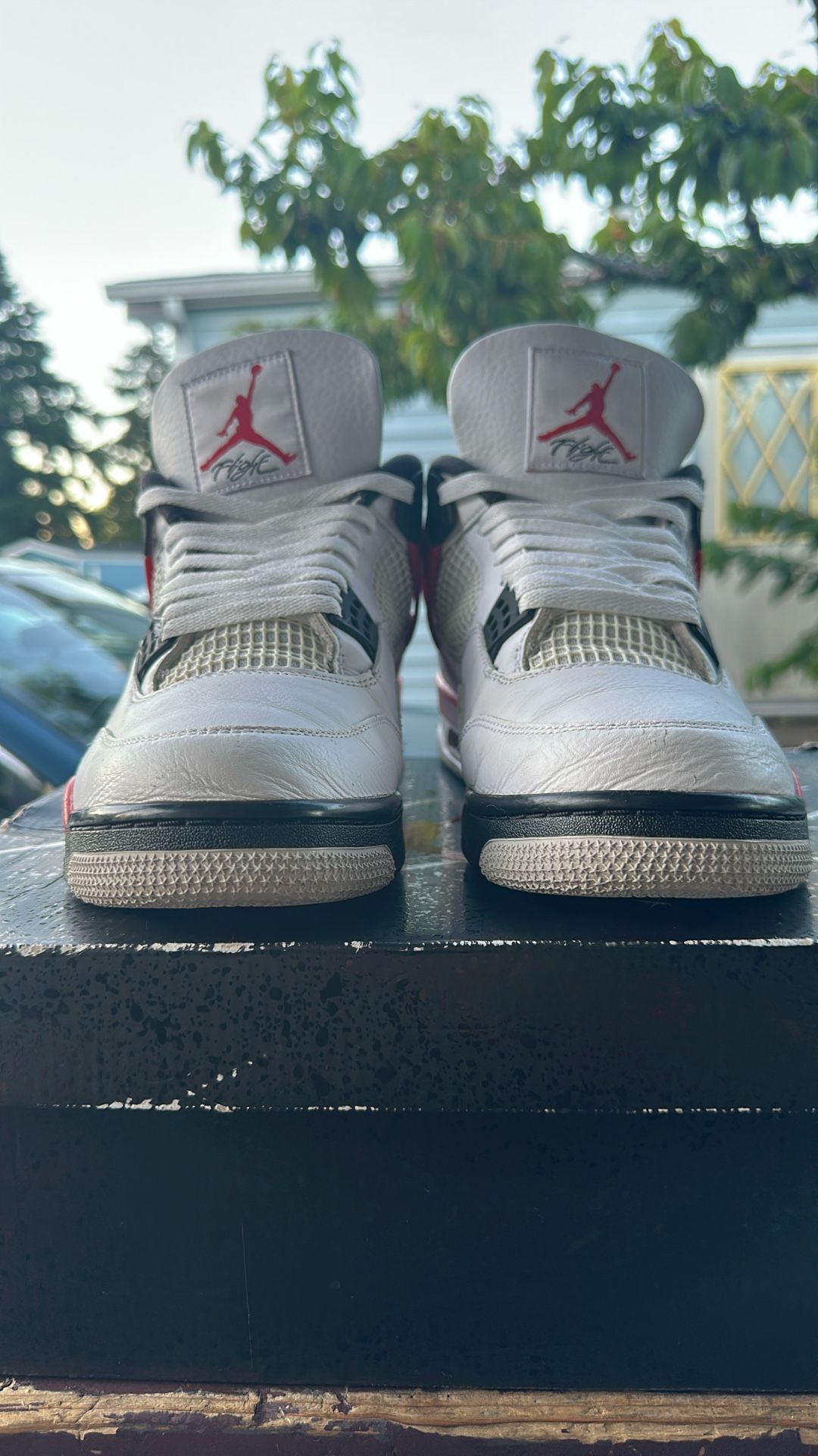 Jordan 4s Red Cement
