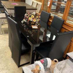 Brand new seven piece dinette for 799 table and six chairs brand new