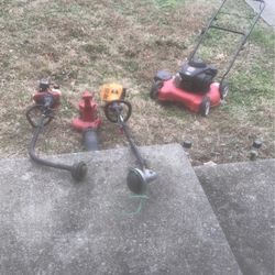 1 Lawnmower 2 Weed eaters & 1 Leaf Blower 