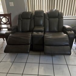 Black Leather Power Reclining Sofa And Love Seat w/ USB & Cup Holders – Ashley