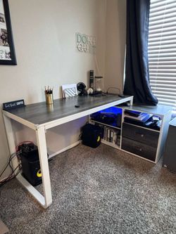 White frame L-shaped desk