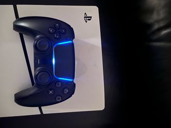PlayStation 5 slim white with black controller