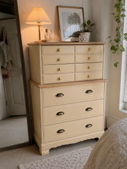 Beige tallboy dresser