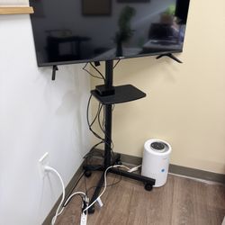 Rolling TV Stand - TV NOT INCLUDED