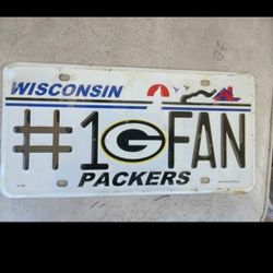 Nfl greenbay packers # 1 fan metal license plate with plastic wrap still on it