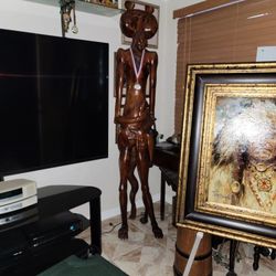 One piece hand carved red Cedar  tree made into. Western style Pink Panther