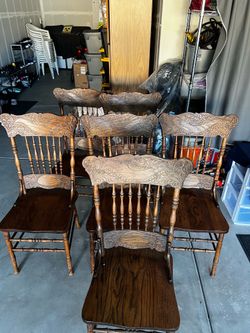 Six sold wood dining chairs