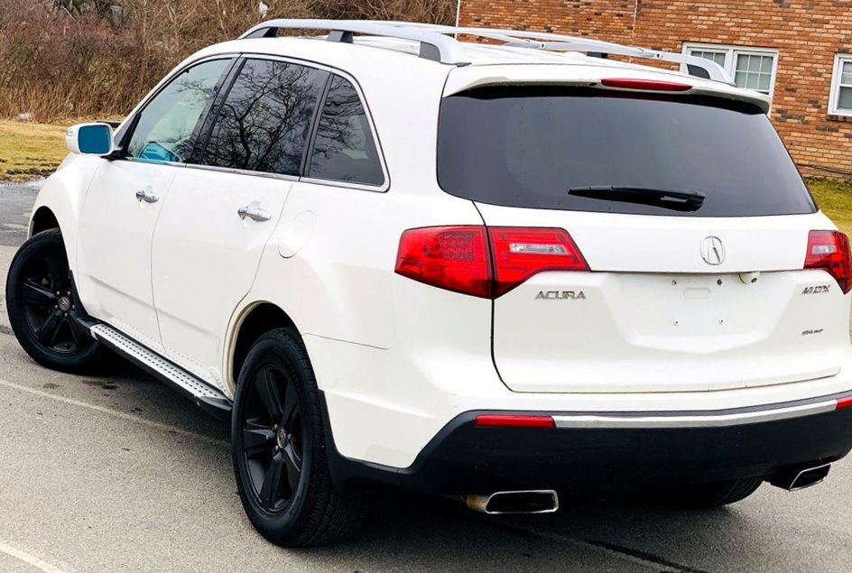 Excellent. Acura MDX 2010 White SUV GreatWheels