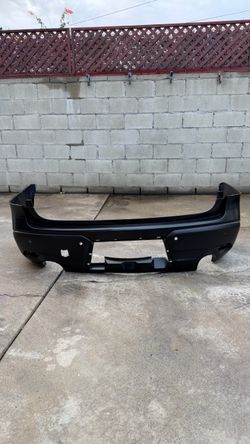 New 2019 - 2023 SUBARU ASCENT REAR BUMPER COVER PANEL W/ SENSOR HOLES OEM 57704XC01A