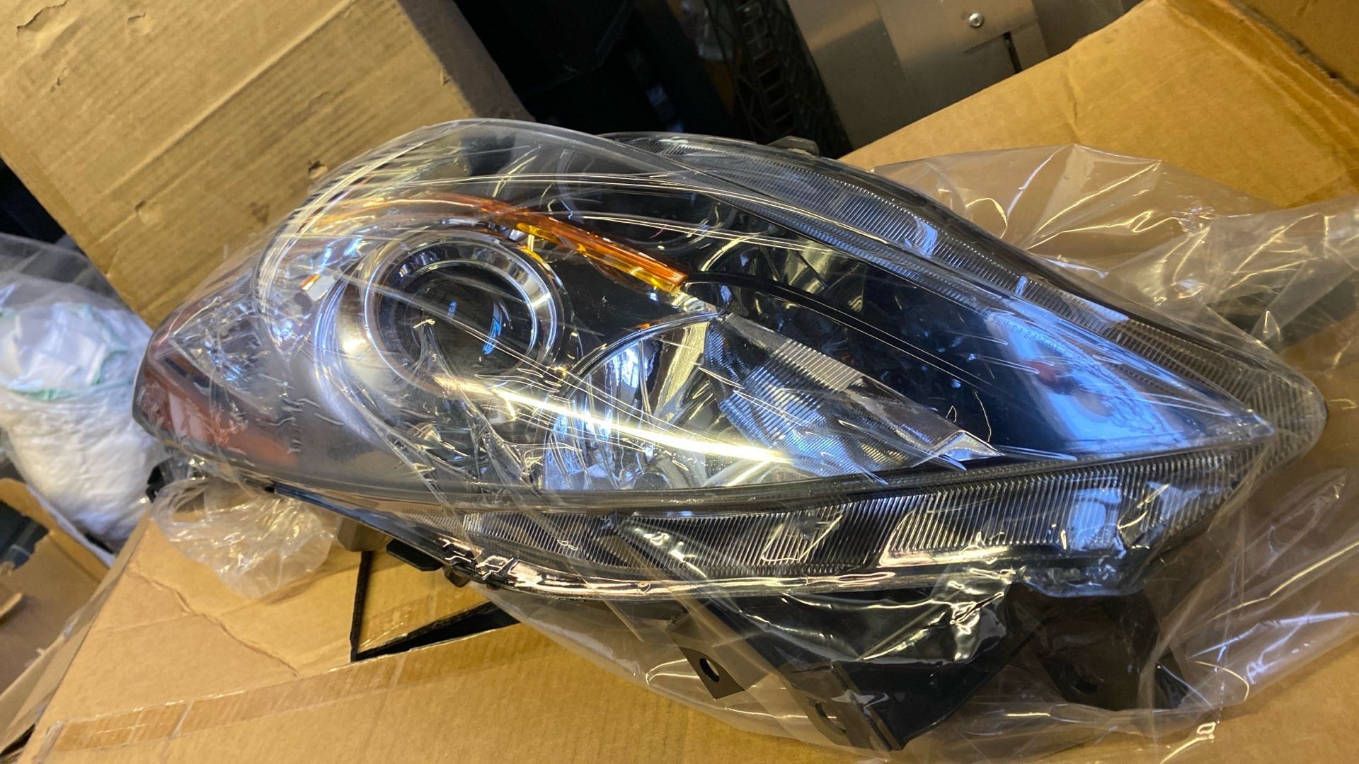 2001-203. MAZDA 3 Headlight Surround