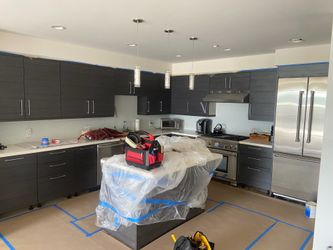 Really good condition lower and upper kitchen cabinets as well as countertop
